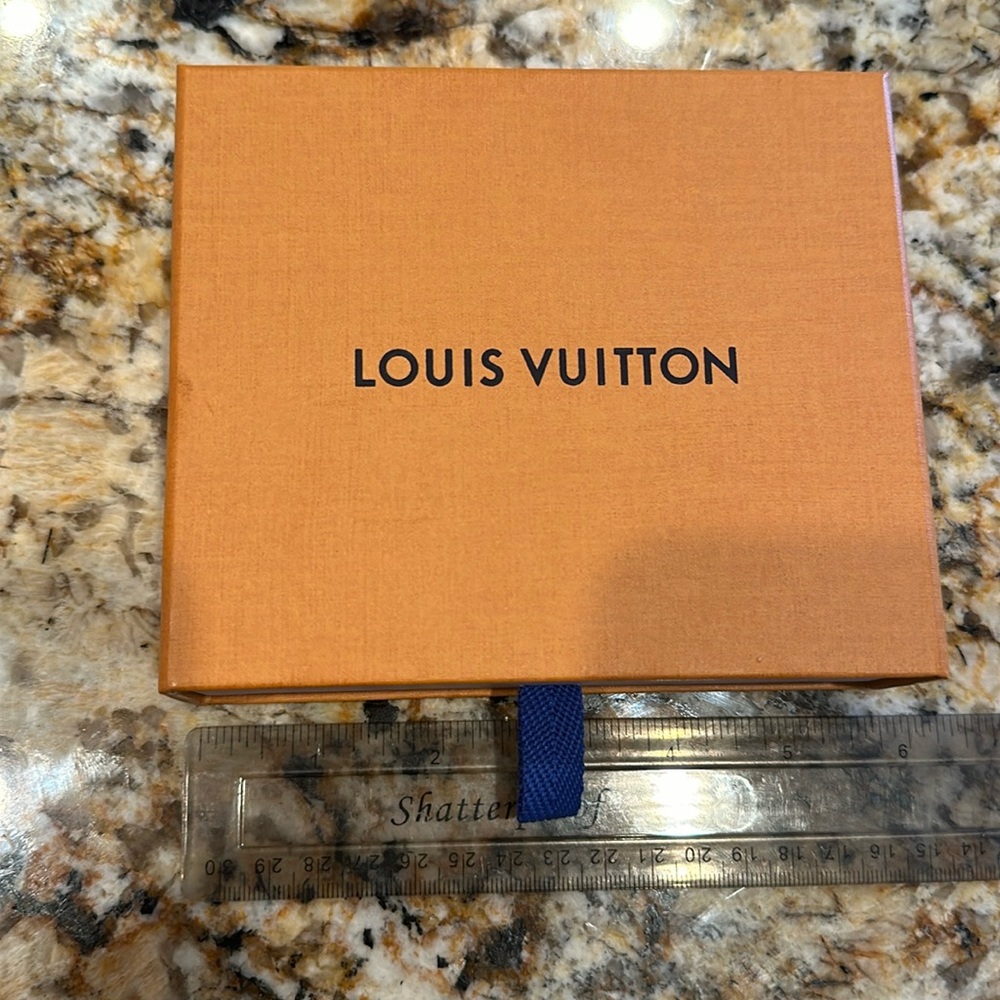 Louis Vuitton small box with small dust bag and Louis Vuitton gift ribbon